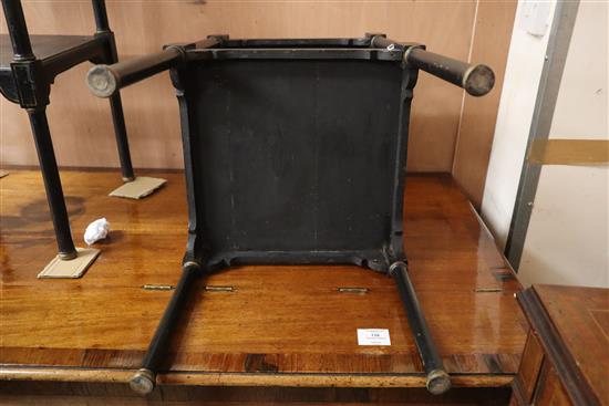 A pair of Regency style gilt and ebonised printed two tier tables W.36cm